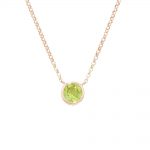 9ct rose gold single peridot necklace. The fresh green peridot gemstone is 5mm and set in 9ct rose gold. The pendant hangs from a hallmarked 9ct rose gold chain. 