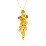 Falling leaf pendant yellow gold