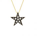 Beautiful medium-sized gold diamond star necklace. The diamonds are set into the 9ct yellow gold star pendant which is plated with black rhodium. It hangs from an adjustable gold chain.