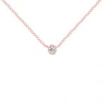 Rose gold single diamond necklace. A single bright brilliant-cut diamond set into 9ct rose gold, attatched to 9ct rose gold adjustable chain.  