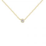 A bright single diamond necklace 9ct gold. The diamond, approximately 0.10cts, is set into 9ct yellow gold and hangs from an adjustable gold chain.