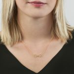 Yellow gold infinity necklace