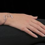 Silver ruby serpent bangle