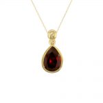 Yellow gold pear garnet pendant