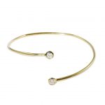 Yellow gold diamond twist bangle